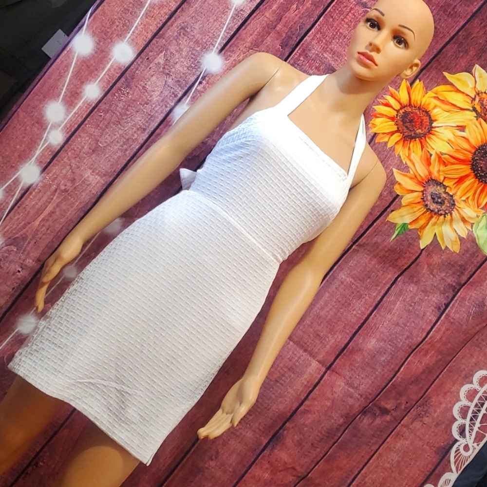 Little white dress waist 26. Length 28. Bust 32